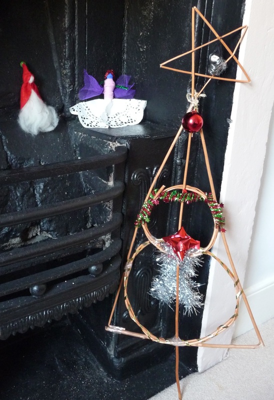 Christmas decorations: a gnome, an angel and a willow tree