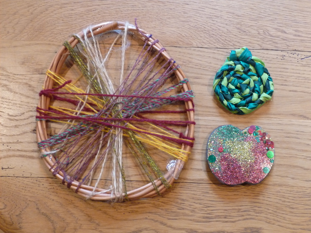 Apple crafts using wool, willow, ribbon and glitter