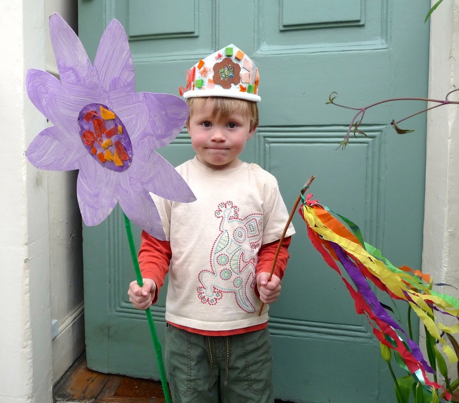 May Day crafts: crown, streamer stick and giant flower