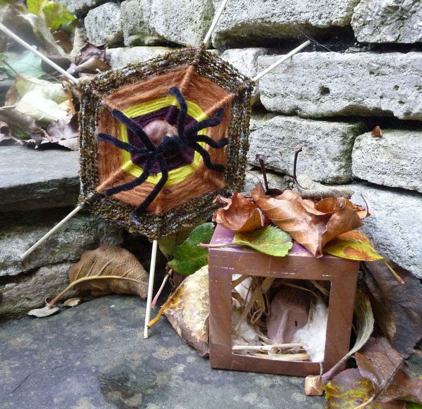 Pipe cleaner spider with woolly web; clay hedgehog in painted box